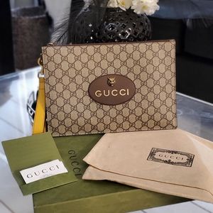 Gucci unisex pouch wristlet